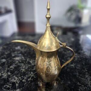 vintage Middle Eastern brass Dallah coffee pot, likely made in India. 